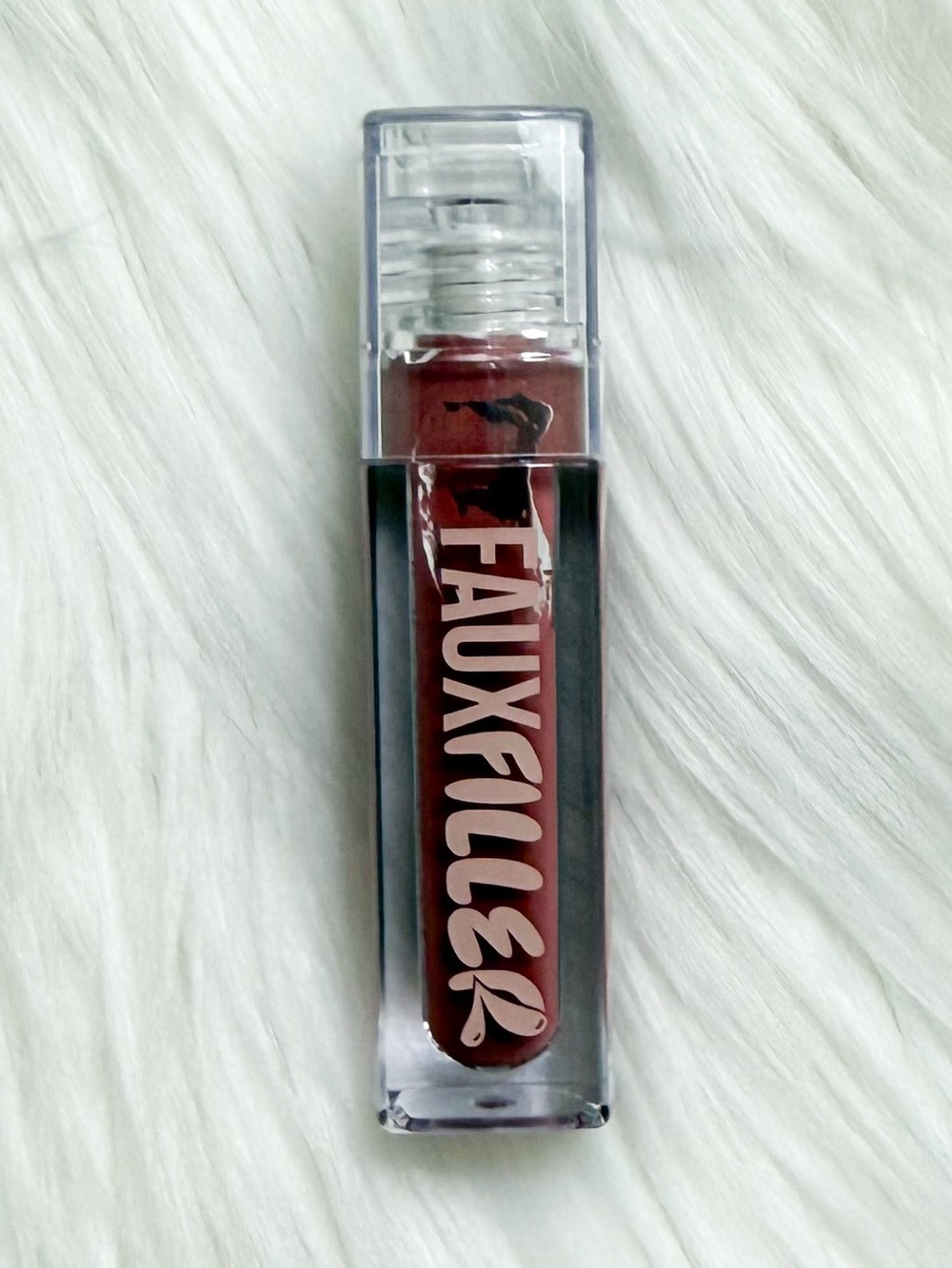 HUDA BEAUTY Faux Filter Lip Gloss “Bombshell”